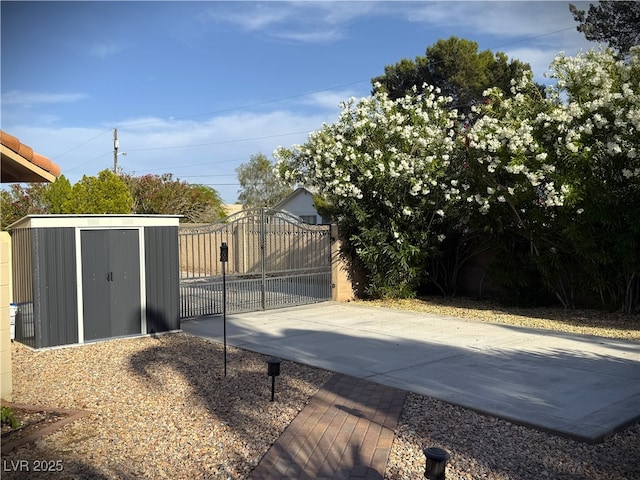 2975 Montessouri St, Las Vegas, NV 89117 - view of concrete surface with a gated entry and a gate