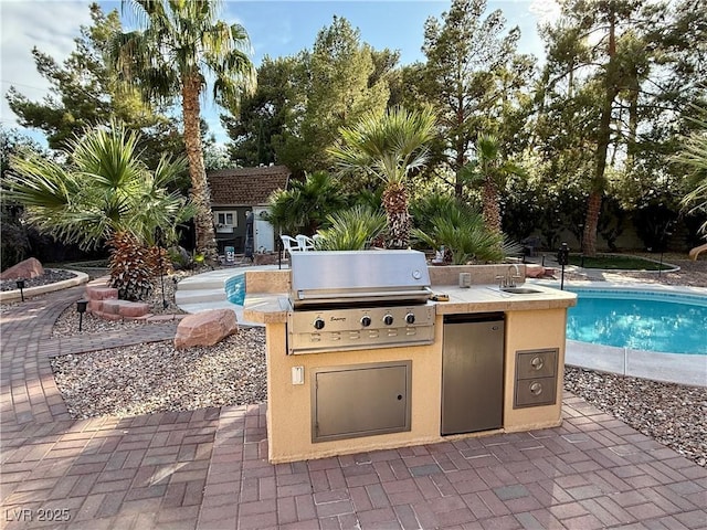 2975 Montessouri St, Las Vegas, NV 89117 - view of patio featuring an outdoor kitchen, an outdoor pool, and an outdoor structure