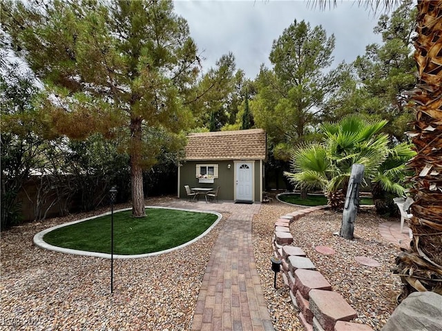2975 Montessouri St, Las Vegas, NV 89117 - view of yard with a storage unit