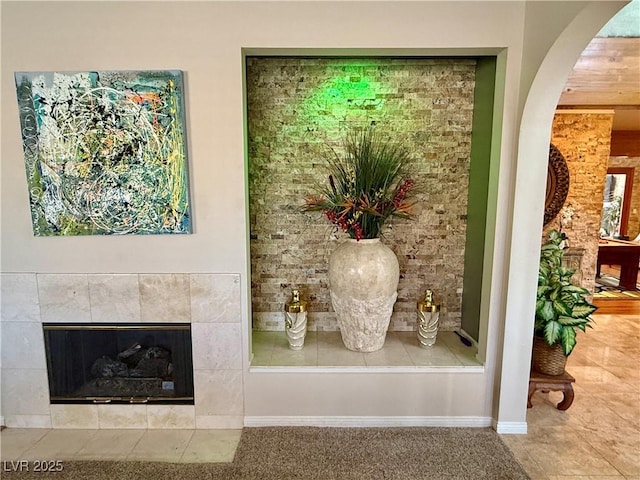 2975 Montessouri St, Las Vegas, NV 89117 - detailed view of arched walkways and a tile fireplace