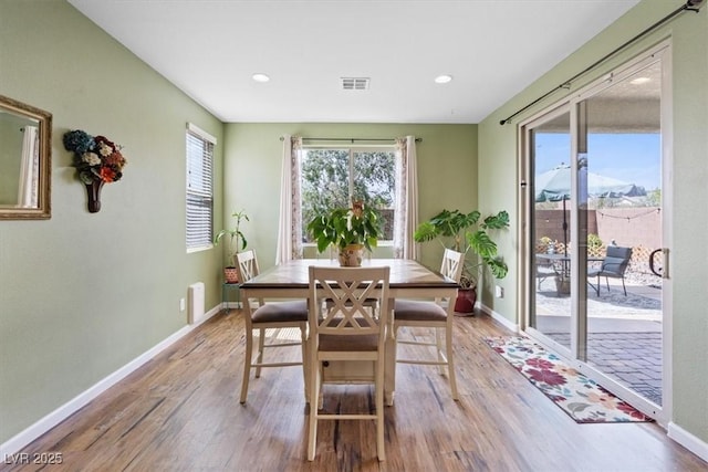 9305 Briar Bridge Ave, Las Vegas, NV 89148 - dining space with wood finished floors and recessed lighting