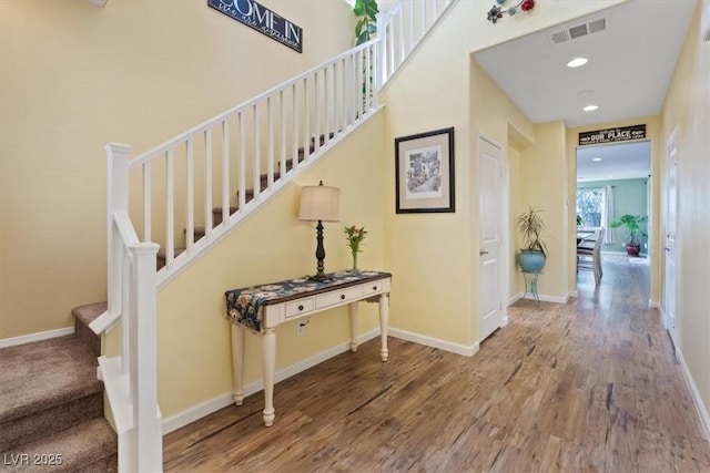 9305 Briar Bridge Ave, Las Vegas, NV 89148 - staircase featuring wood finished floors and recessed lighting