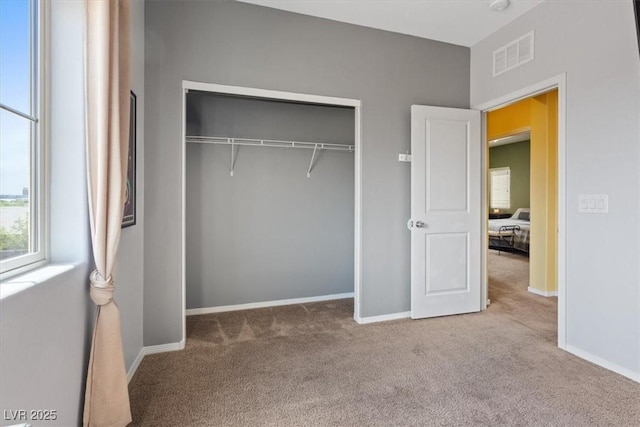 9305 Briar Bridge Ave, Las Vegas, NV 89148 - unfurnished bedroom featuring carpet flooring and a closet
