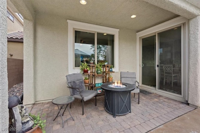 9305 Briar Bridge Ave, Las Vegas, NV 89148 - view of patio featuring an outdoor fire pit