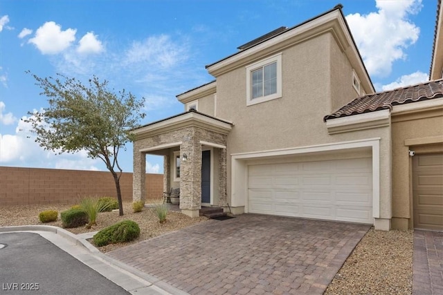9305 Briar Bridge Ave, Las Vegas, NV 89148 - view of front facade featuring stucco siding, driveway, a garage, and a tiled roof
