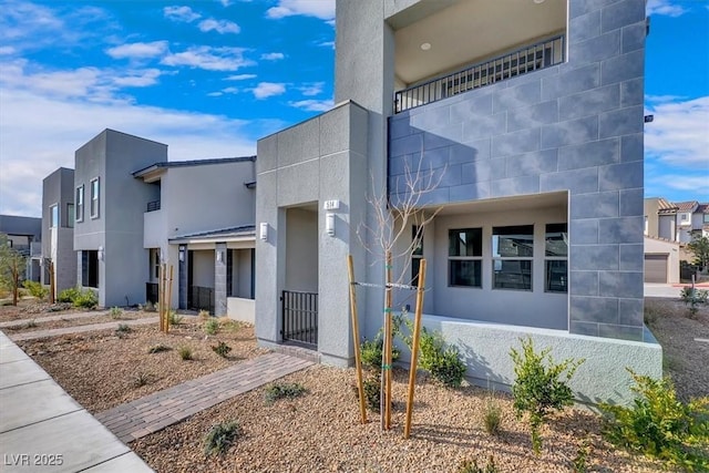 514 Fairview Hills St, Las Vegas, NV 89138 - contemporary house with stucco siding and a residential view