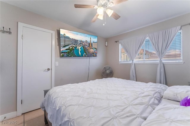 2690 Diamante Cir, Las Vegas, NV 89121 - bedroom with light tile patterned floors and ceiling fan