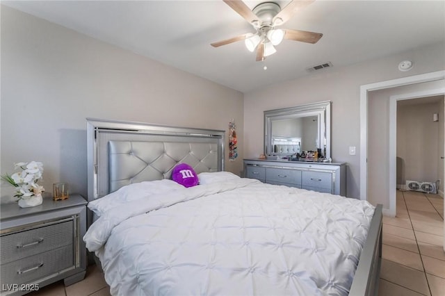 2690 Diamante Cir, Las Vegas, NV 89121 - bedroom with light tile patterned flooring and a ceiling fan