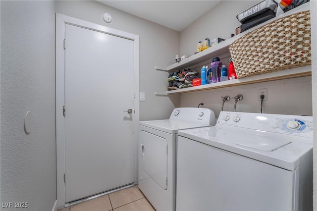 2690 Diamante Cir, Las Vegas, NV 89121 - laundry room featuring washing machine and dryer and light tile patterned flooring