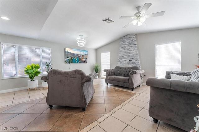 2690 Diamante Cir, Las Vegas, NV 89121 - living room featuring vaulted ceiling, light tile patterned flooring, and ceiling fan