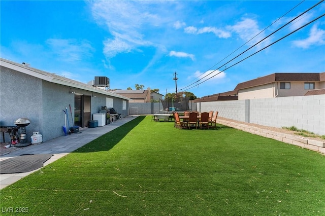 2690 Diamante Cir, Las Vegas, NV 89121 - fenced backyard featuring a trampoline