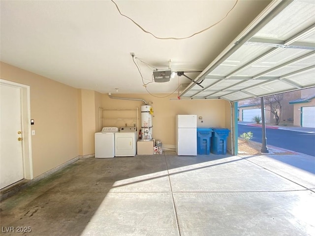5266 Souvenir Ln, Las Vegas, NV 89118 - garage featuring freestanding refrigerator, strapped water heater, independent washer and dryer, and a garage door opener