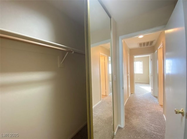 5266 Souvenir Ln, Las Vegas, NV 89118 - corridor featuring light carpet and baseboards