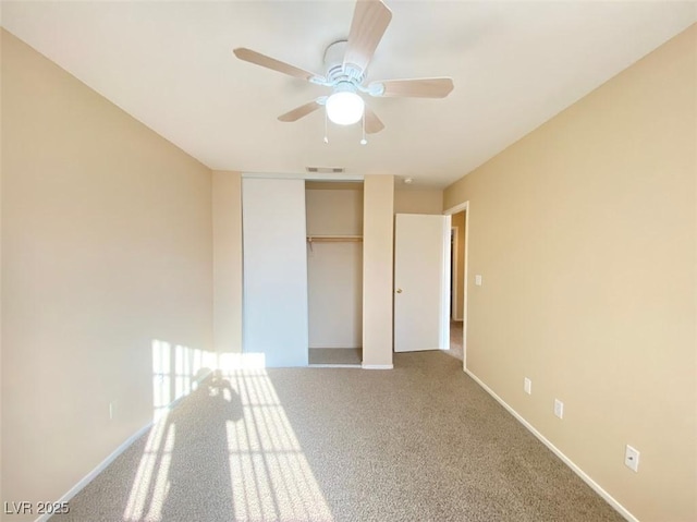 5266 Souvenir Ln, Las Vegas, NV 89118 - unfurnished bedroom with a closet, carpet, and a ceiling fan