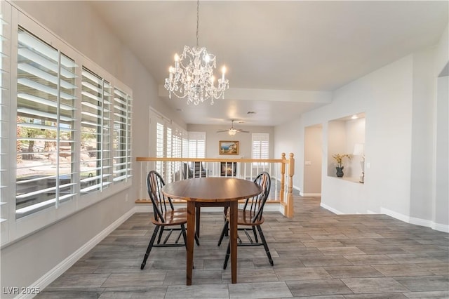 8424 Willowleaf Ct, Las Vegas, NV 89128 - dining room featuring a ceiling fan, a chandelier, and wood finished floors