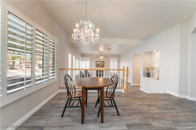 8424 Willowleaf Ct, Las Vegas, NV 89128 - dining room with a ceiling fan, a chandelier, and wood finished floors