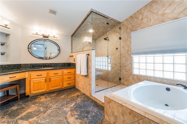 8424 Willowleaf Ct, Las Vegas, NV 89128 - bathroom featuring a bath, vanity, a shower stall, and marble finish floors