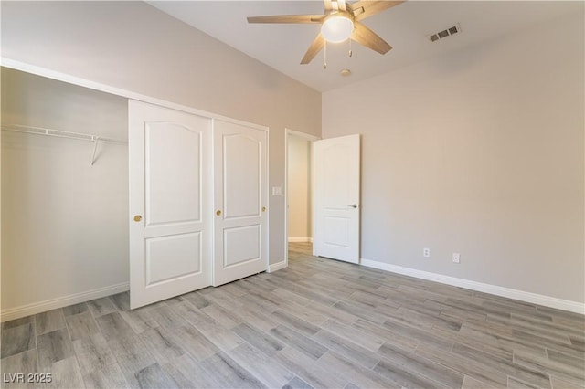 8424 Willowleaf Ct, Las Vegas, NV 89128 - unfurnished bedroom featuring wood finished floors, a closet, and a ceiling fan