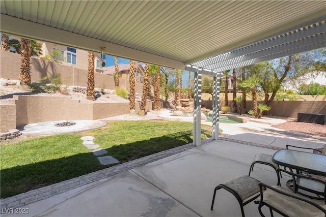 8424 Willowleaf Ct, Las Vegas, NV 89128 - fenced backyard featuring a fire pit and a patio