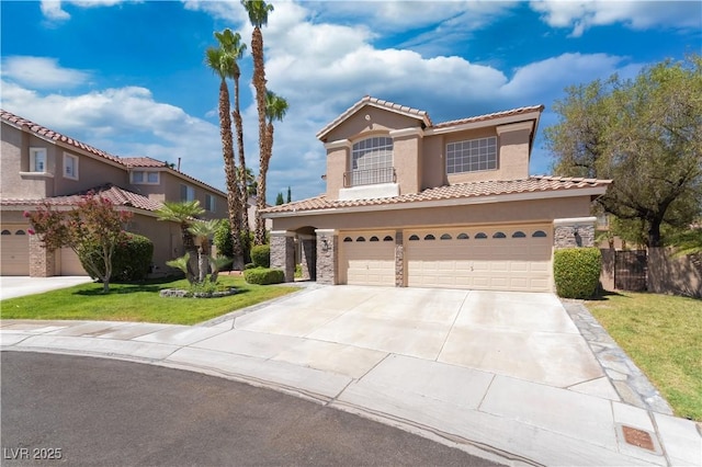 8424 Willowleaf Ct, Las Vegas, NV 89128 - mediterranean / spanish-style home with stucco siding, a tile roof, driveway, and an attached garage