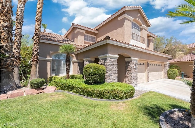 8424 Willowleaf Ct, Las Vegas, NV 89128 - mediterranean / spanish-style home featuring an attached garage, stucco siding, driveway, a front lawn, and a tile roof