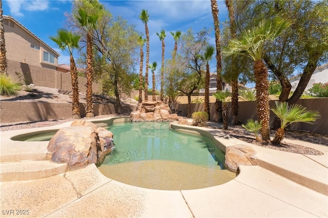 8424 Willowleaf Ct, Las Vegas, NV 89128 - view of pool with a fenced backyard and an in-ground hot tub