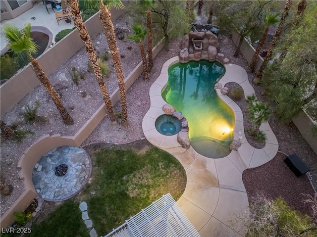 8424 Willowleaf Ct, Las Vegas, NV 89128 - view of pool with a patio area, a fenced backyard, and a pool with connected hot tub