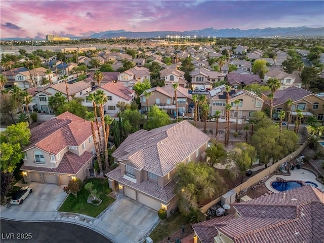 8424 Willowleaf Ct, Las Vegas, NV 89128 - aerial view at dusk of a residential view and a mountain view