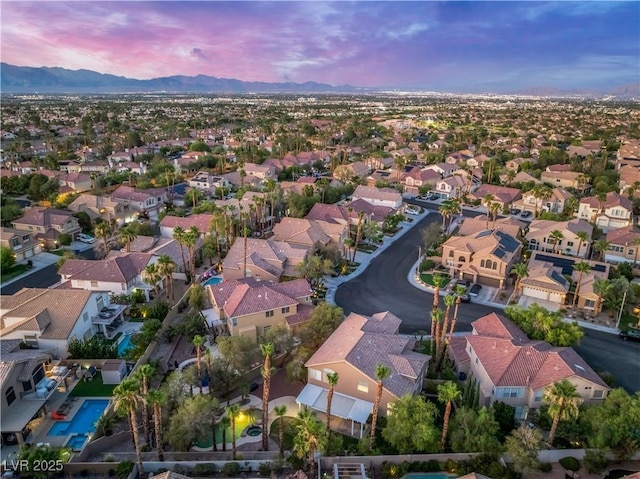 8424 Willowleaf Ct, Las Vegas, NV 89128 - aerial view at dusk of a residential view and a mountain view