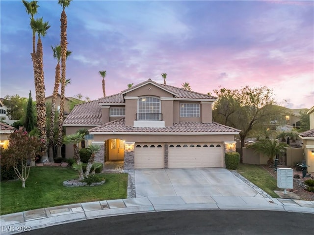 8424 Willowleaf Ct, Las Vegas, NV 89128 - mediterranean / spanish-style house featuring stucco siding, driveway, a tile roof, and a garage