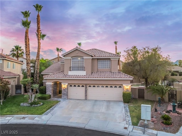 8424 Willowleaf Ct, Las Vegas, NV 89128 - mediterranean / spanish home featuring stucco siding, a tiled roof, a garage, driveway, and stone siding
