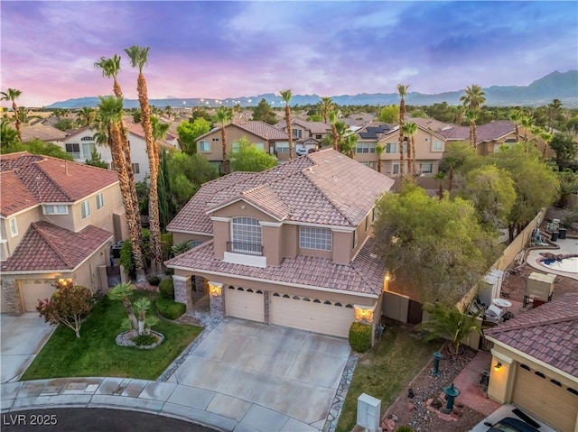 8424 Willowleaf Ct, Las Vegas, NV 89128 - aerial view at dusk of a residential view and a mountain view
