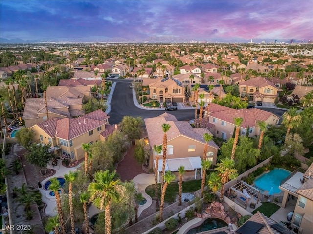 8424 Willowleaf Ct, Las Vegas, NV 89128 - aerial view at dusk of a residential view and view of pool area