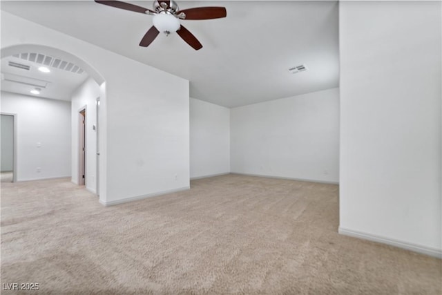 9217 Apollo Heights Ave, Las Vegas, NV 89149 - unfurnished room with carpet, ceiling fan, and arched walkways