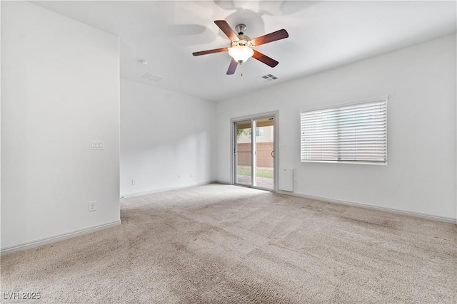 9217 Apollo Heights Ave, Las Vegas, NV 89149 - empty room with carpet floors and a ceiling fan