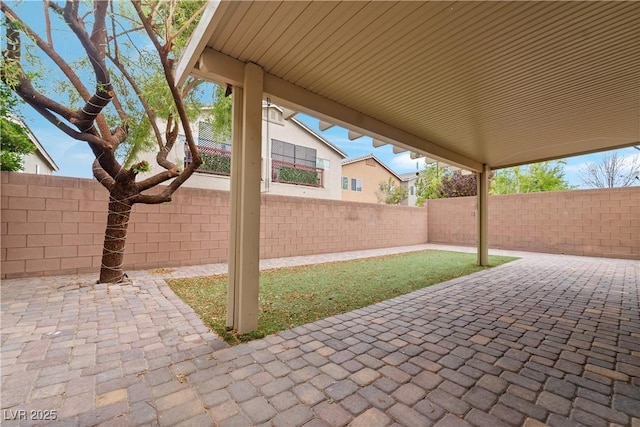 9217 Apollo Heights Ave, Las Vegas, NV 89149 - fenced backyard featuring a patio