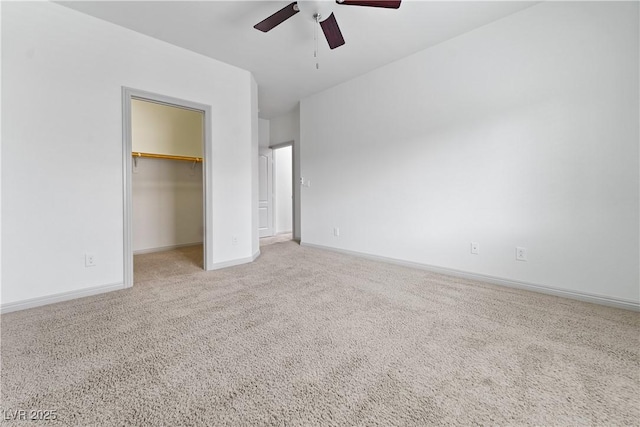 9217 Apollo Heights Ave, Las Vegas, NV 89149 - unfurnished bedroom with carpet floors, a walk in closet, a closet, and a ceiling fan