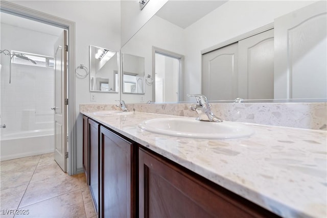 9217 Apollo Heights Ave, Las Vegas, NV 89149 - full bathroom with double vanity, tile patterned flooring, and shower / bath combination