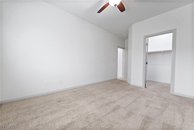 9217 Apollo Heights Ave, Las Vegas, NV 89149 - unfurnished bedroom with carpet flooring, a spacious closet, a ceiling fan, and a closet