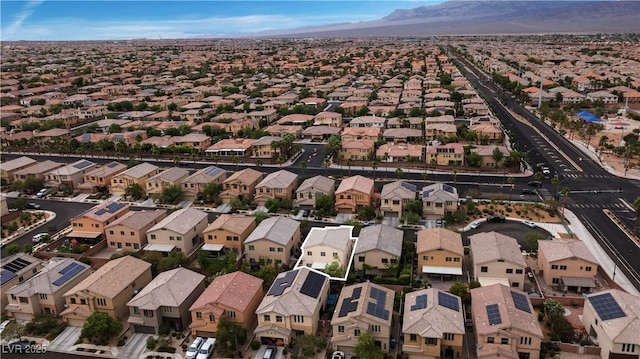 9217 Apollo Heights Ave, Las Vegas, NV 89149 - aerial view of property's location featuring a mountain backdrop and nearby suburban area