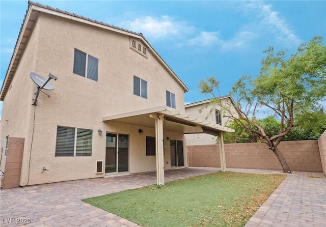 9217 Apollo Heights Ave, Las Vegas, NV 89149 - back of property featuring a patio and stucco siding