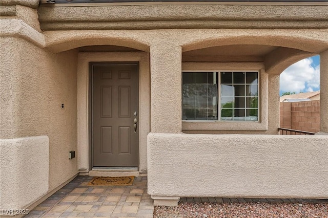 5541 Meridian Rain St, North Las Vegas, NV 89031 - view of exterior entry featuring stucco siding