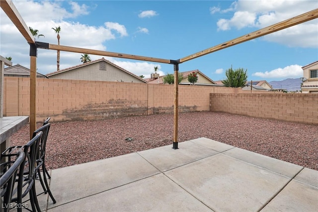 5541 Meridian Rain St, North Las Vegas, NV 89031 - fenced backyard featuring a patio area