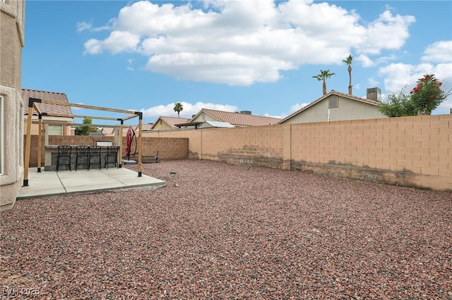5541 Meridian Rain St, North Las Vegas, NV 89031 - fenced backyard featuring a patio