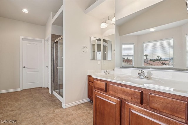 5541 Meridian Rain St, North Las Vegas, NV 89031 - full bathroom featuring double vanity, a stall shower, and tile patterned floors