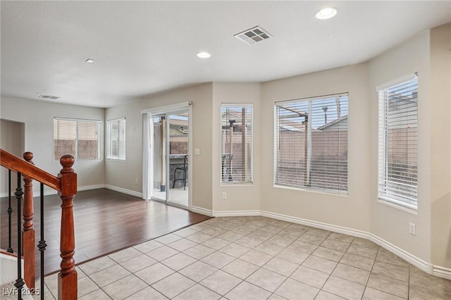 5541 Meridian Rain St, North Las Vegas, NV 89031 - spare room with healthy amount of natural light, recessed lighting, light wood-style floors, and stairs