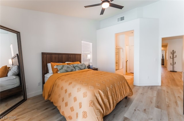 7909 Lovely Pine Pl, Las Vegas, NV 89143 - bedroom featuring light wood finished floors, a ceiling fan, high vaulted ceiling, and ensuite bath