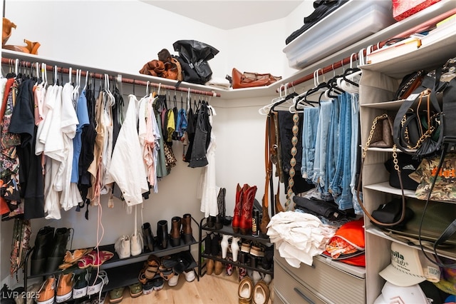 7909 Lovely Pine Pl, Las Vegas, NV 89143 - walk in closet with wood finished floors