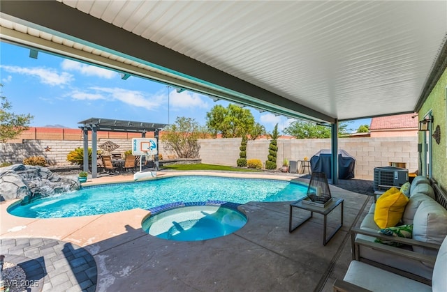 7909 Lovely Pine Pl, Las Vegas, NV 89143 - view of swimming pool with a grill, a pool with connected hot tub, a patio area, and a fenced backyard