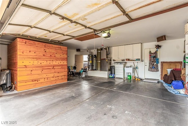 3938 Redfield Ave, North Las Vegas, NV 89032 - garage featuring a garage door opener, water heater, and heating unit